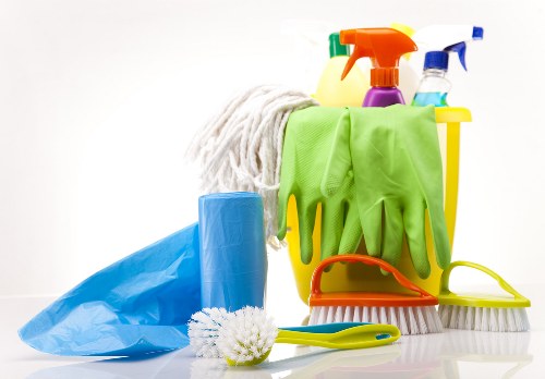 Home cleaners in Acton working on a tidy, refreshed living space