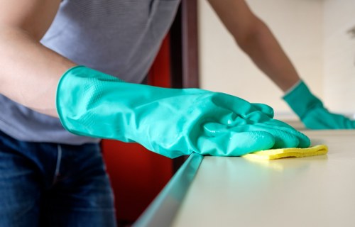 Kitchen surfaces and appliances cleaned as part of domestic cleaning in Acton